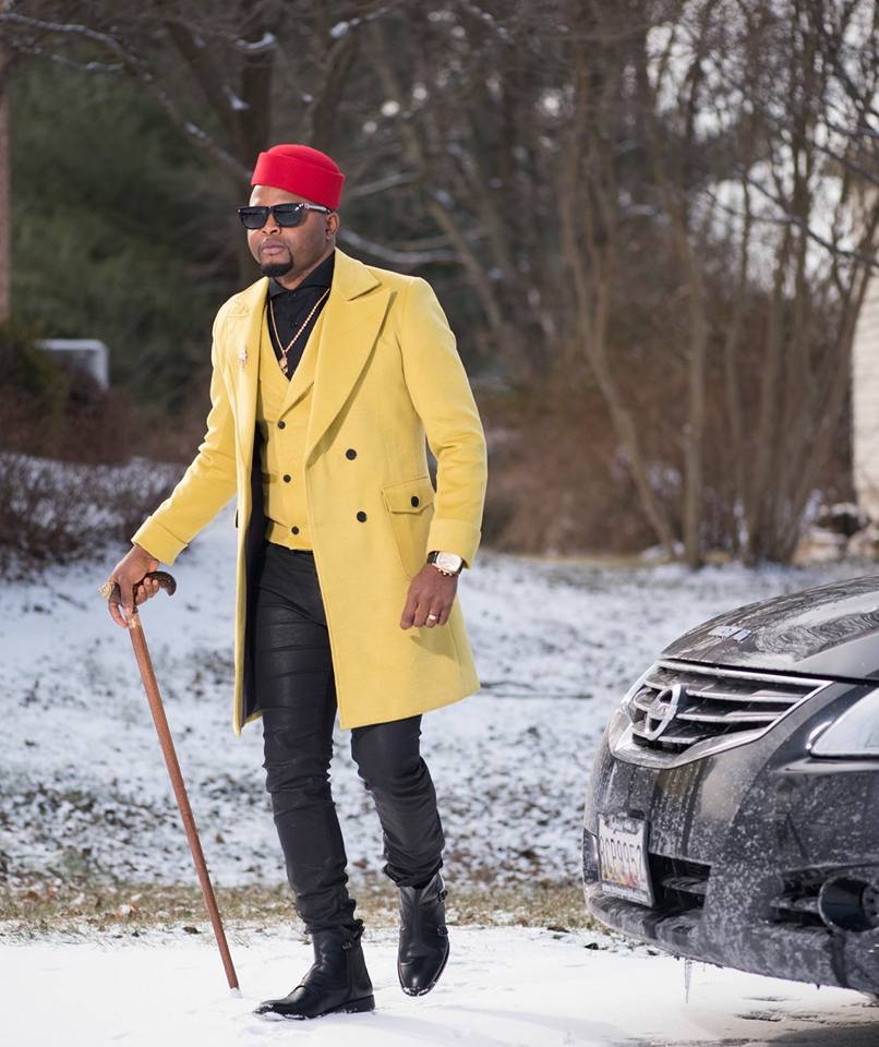 Cameroonian Designer Stanlo Akisa Looks Dashing In Dandy Yellow Coat