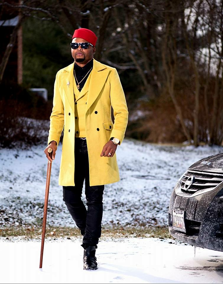 Cameroonian Designer Stanlo Akisa Looks Dashing In Dandy Yellow Coat