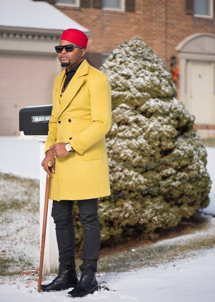 Cameroonian Designer Stanlo Akisa Looks Dashing In Dandy Yellow Coat