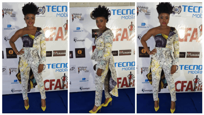 ACTRESS NSANG DILONG ROCKS RED CARPET IN A CASCADING ANKARA INSPIRED & LACE HIGH-LOW PEPLUM OUTFIT