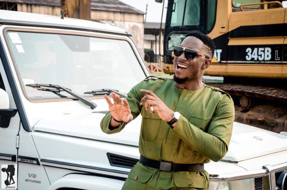 Stanley Enow celebrates his birthday in army green khaki BY Whizz Kliff design