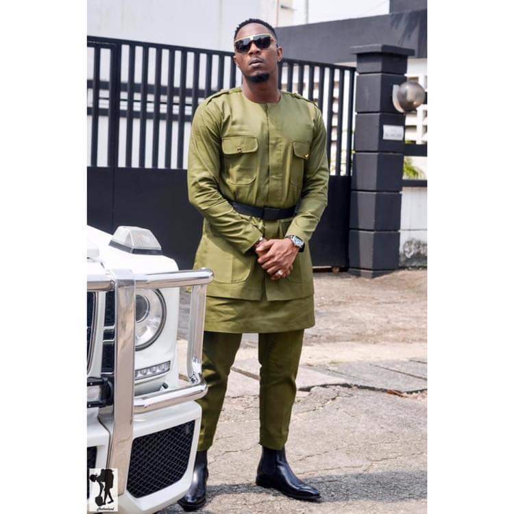 Stanley Enow celebrates his birthday in army green khaki by Whizz Kliff design