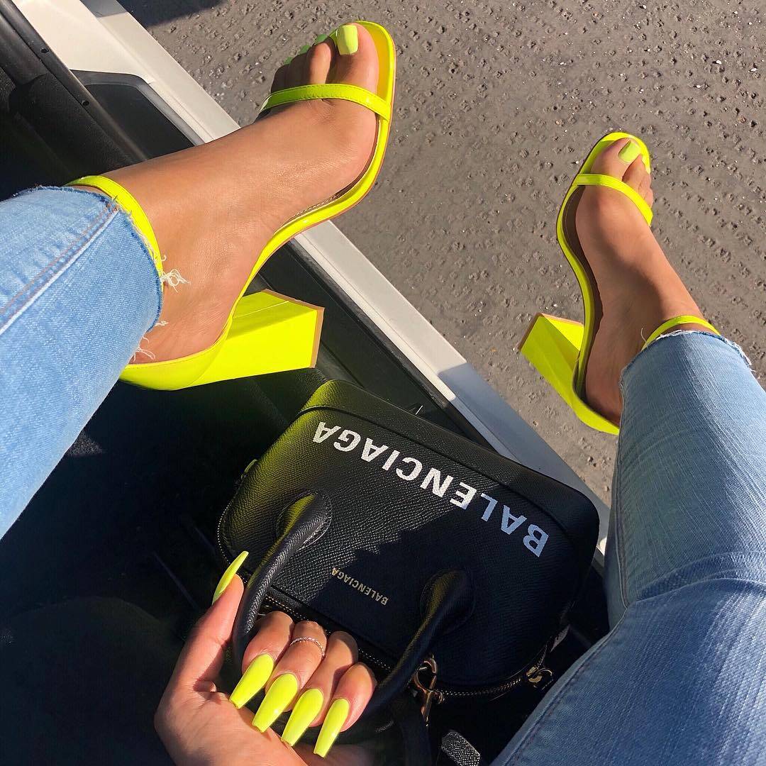 Balenciaga hand bag and yellow sandals