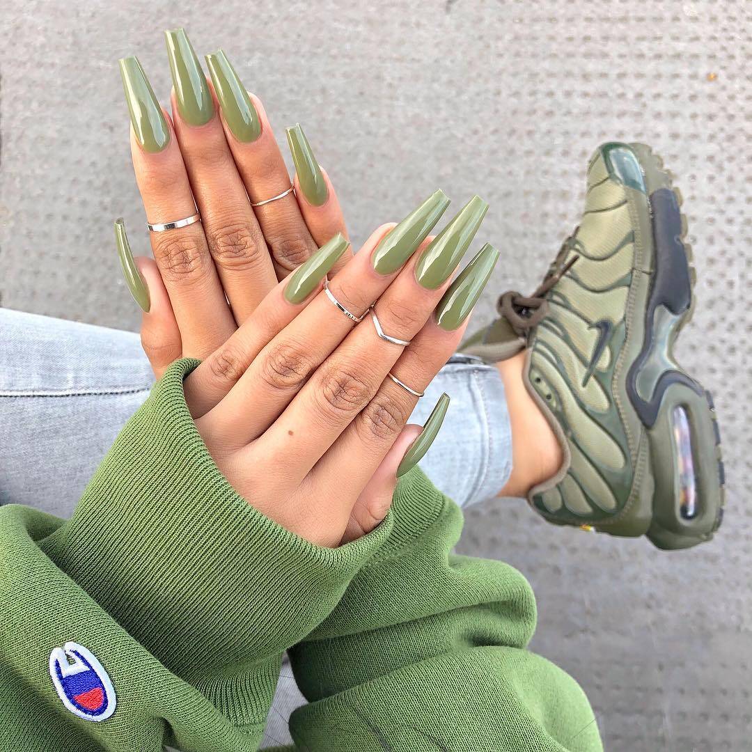 Green nail polish and Green Nike Sneakers