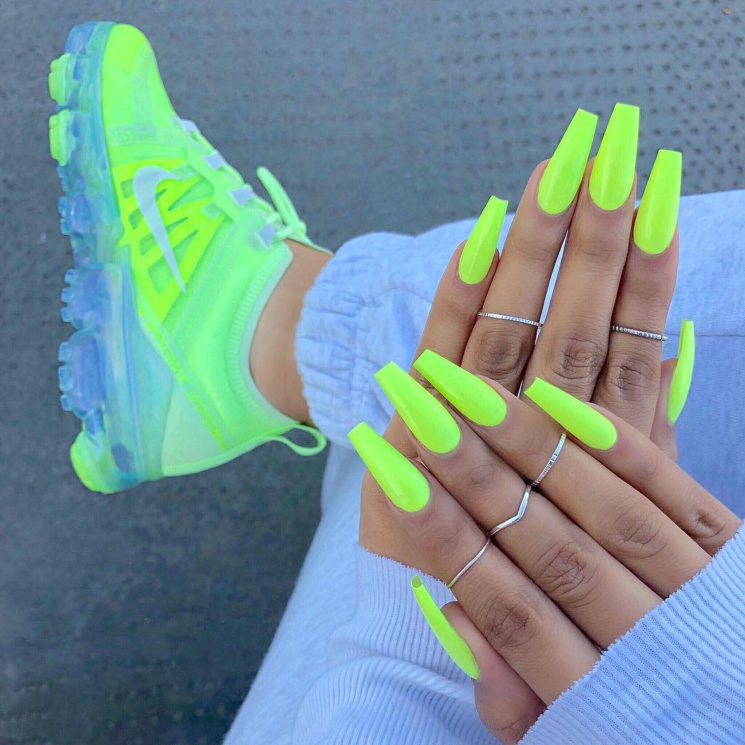 neon green Nike sneakers