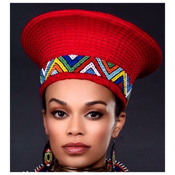 Pearl Thusi In Zulu Elaborate Red Hat