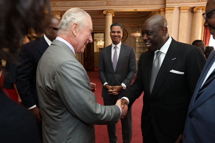 Rene Awambeng with King Charles